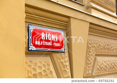 Street sign on a beautiful building facade in Prague. Small country Street sign on a beautiful building facade in Prague. Small country 69788292