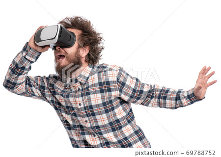 Crazy bearded man with VR goggles Crazy bearded man with VR goggles 69788752