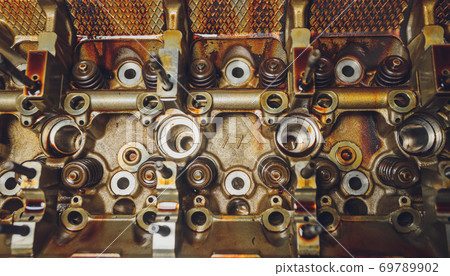 The iron gearbox of a car s transmission disassembly of the transmission chain and parts, repair. 69789902