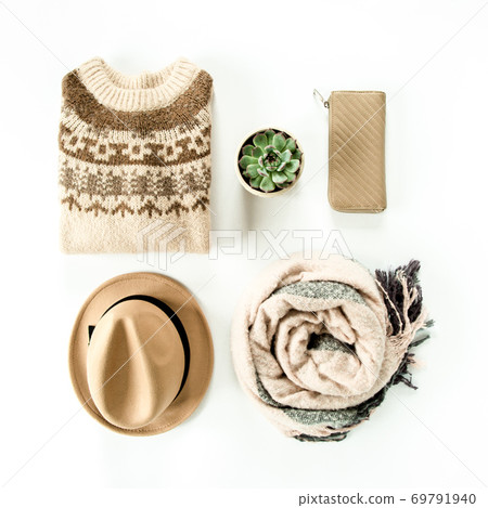 Woman clothes and accessories set on white background top view. modern and casual outfit. fashion, shopping and makeup concept. Flat lay, top view. Woman clothes and accessories set on white background top view. modern and casual outfit. fashion, shopping and makeup concept. Flat lay, top view. 69791940