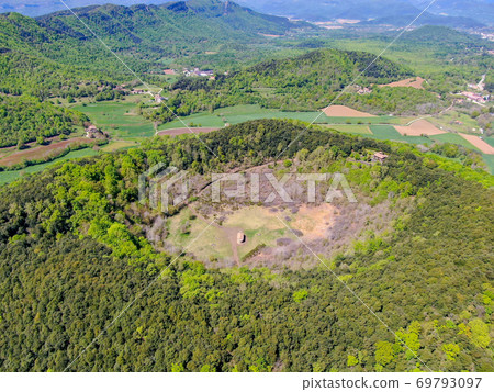 The Santa Margarida Volcano is an extinct volcano in the comarca of Garrotxa, Catalonia, Spain. The Santa Margarida Volcano is an extinct volcano in the comarca of Garrotxa, Catalonia, Spain. 69793097