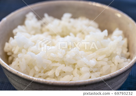 White rice served in a bowl 69793232