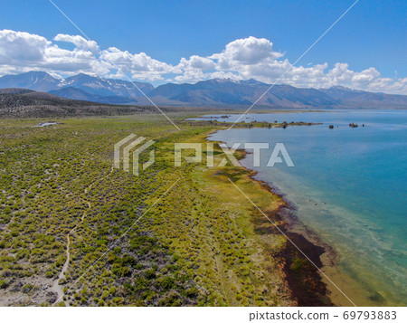 Aerial view of Mono Lake with tufa rock formations during summer season, Mono County Aerial view of Mono Lake with tufa rock formations during summer season, Mono County 69793883