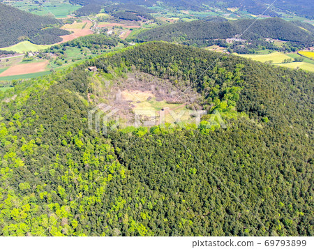 The Santa Margarida Volcano is an extinct volcano in the comarca of Garrotxa, Catalonia, Spain. The Santa Margarida Volcano is an extinct volcano in the comarca of Garrotxa, Catalonia, Spain. 69793899