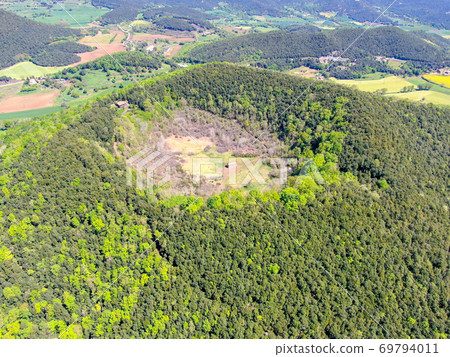 The Santa Margarida Volcano is an extinct volcano in the comarca of Garrotxa, Catalonia, Spain.  69794011