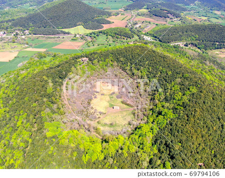 The Santa Margarida Volcano is an extinct volcano in the comarca of Garrotxa, Catalonia, Spain.  69794106