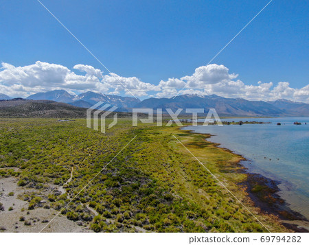 Aerial view of Mono Lake with tufa rock formations during summer season, Mono County 69794282