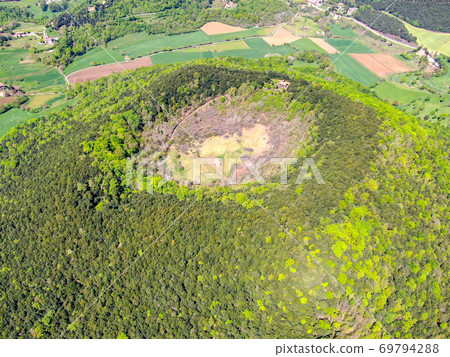 The Santa Margarida Volcano is an extinct volcano in the comarca of Garrotxa, Catalonia, Spain. The Santa Margarida Volcano is an extinct volcano in the comarca of Garrotxa, Catalonia, Spain. 69794288