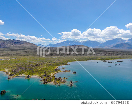 Aerial view of Mono Lake with tufa rock formations during summer season, Mono County Aerial view of Mono Lake with tufa rock formations during summer season, Mono County 69794358