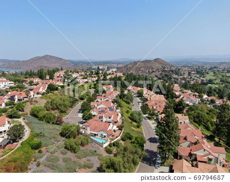 Aerial view of middle class neighborhood with residential house community, South California 69794687