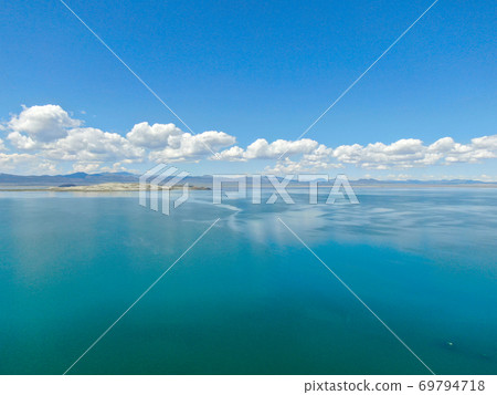 Aerial view of Mono Lake with tufa rock formations during summer season, Mono County Aerial view of Mono Lake with tufa rock formations during summer season, Mono County 69794718