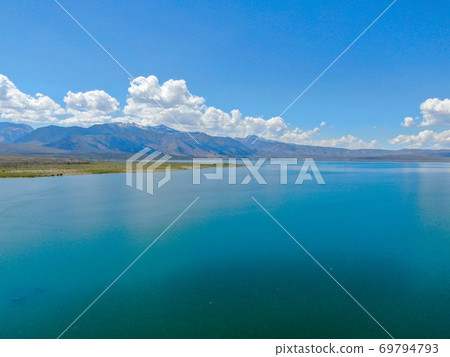 Aerial view of Mono Lake with tufa rock formations during summer season, Mono County Aerial view of Mono Lake with tufa rock formations during summer season, Mono County 69794793