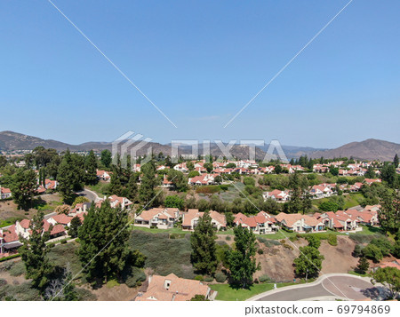 Aerial view of middle class neighborhood with residential house community, San Diego 69794869