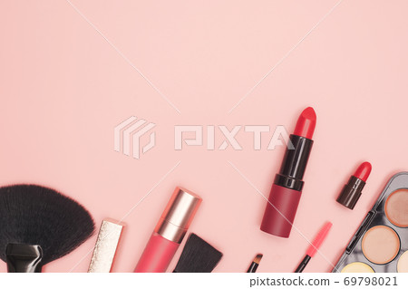 set of professional cosmetics, makeup tools and accessories on pink background, beauty, fashion, shopping concept, flat lay set of professional cosmetics, makeup tools and accessories on pink background, beauty, fashion, shopping concept, flat lay 69798021