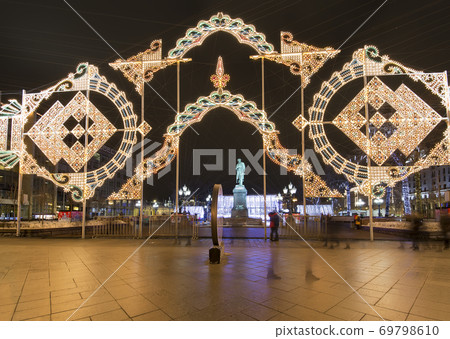 New Year and Christmas lighting decoration of the city --- Pushkin Square (Festival "Journey to Christmas"), Moscow. Russia New Year and Christmas lighting decoration of the city --- Pushkin Square (Festival "Journey to Christmas"), Moscow. Russia 69798610