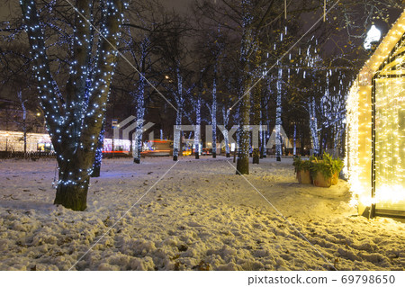 New Year and Christmas lighting decoration of the city, Novopushkinsky Square, Moscow. Russia New Year and Christmas lighting decoration of the city, Novopushkinsky Square, Moscow. Russia 69798650