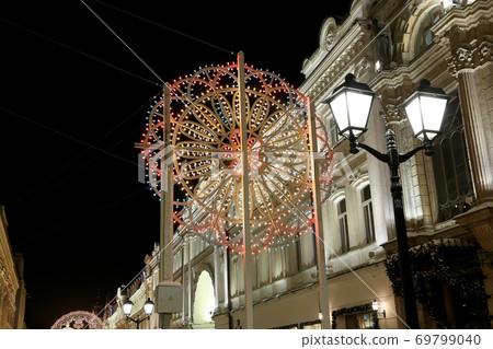 Christmas (New Year holidays) illumination on Nikolskaya Street near the Moscow Kremlin at night, Russia Christmas (New Year holidays) illumination on Nikolskaya Street near the Moscow Kremlin at night, Russia 69799040