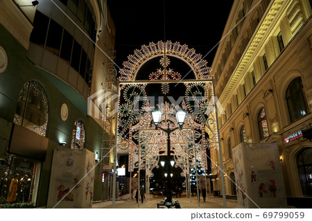 Christmas (New Year holidays) illumination on Nikolskaya Street near the Moscow Kremlin at night, Russia Christmas (New Year holidays) illumination on Nikolskaya Street near the Moscow Kremlin at night, Russia 69799059