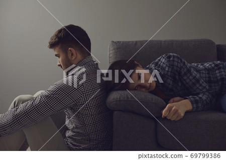 Unhappy couple quarreling offended in a divorce. Unhappy couple quarreling offended in a divorce. 69799386