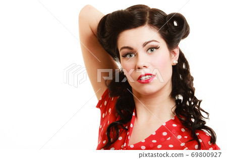Retro. Portrait of woman girl with pinup hairstyle Retro. Portrait of woman girl with pinup hairstyle 69800927
