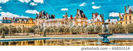 Suburban Residence of the France Kings - beautiful Chateau Fontainebleau with the fountain on foreground. Suburban Residence of the France Kings - beautiful Chateau Fontainebleau with the fountain on foreground. 69802014