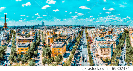 PARIS, FRANCE- JULY 06, 2016 :Beautiful panoramic view of Paris from the roof of the Triumphal Arch. Champs Elysees and the Eiffel Tower. PARIS, FRANCE- JULY 06, 2016 :Beautiful panoramic view of Paris from the roof of the Triumphal Arch. Champs Elysees and the Eiffel Tower. 69802485