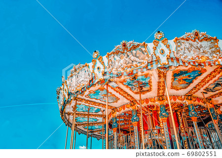 Entertainment Carousel for the youngest children. Horses on a carnival. Entertainment Carousel for the youngest children. Horses on a carnival. 69802551