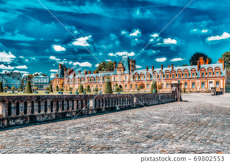 FONTAINEBLEAU, FRANCE - JULY 09, 2016 :Suburban Residence of the France Kings - beautiful Chateau Fontainebleau and surrounding his park. FONTAINEBLEAU, FRANCE - JULY 09, 2016 :Suburban Residence of the France Kings - beautiful Chateau Fontainebleau and surrounding his park. 69802553