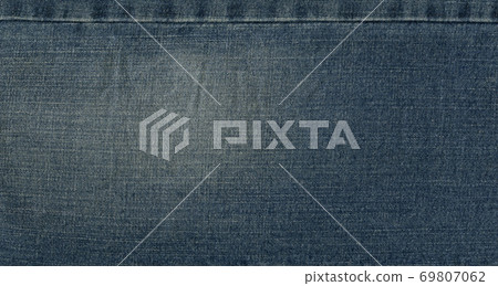 Seam blue denim cotton jeans fabric texture Seam blue denim cotton jeans fabric texture 69807062