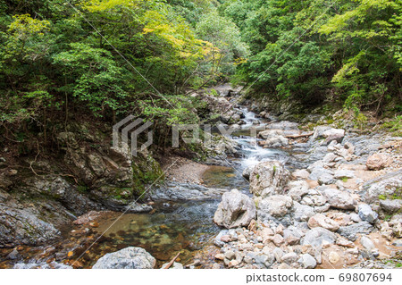 Beautiful Mizufuji Kawachi Valley flowing through the clear stream Kuwabara River 69807694