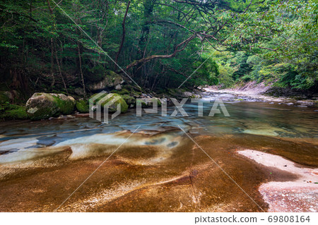 Beautiful Mizufuji Kawachi Valley flowing through the clear stream Kuwabara River 69808164