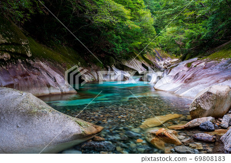 Beautiful Mizufuji Kawachi Valley flowing through the clear stream Kuwabara River Beautiful Mizufuji Kawachi Valley flowing through the clear stream Kuwabara River 69808183