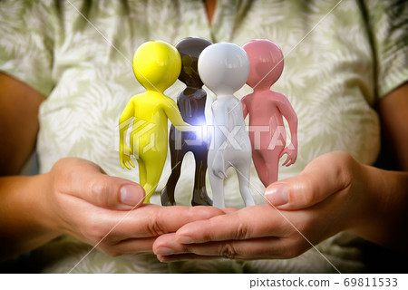 Men of different races stand in a circle on a woman's hands. 69811533