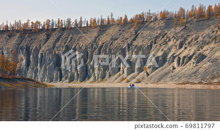 Larch taiga in September on the banks of the river and in Evenkia Larch taiga in September on the banks of the river and in Evenkia 69811797