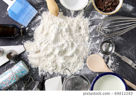 flour with baking and cooking ingredients on table flour with baking and cooking ingredients on table 69812283