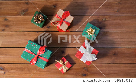 christmas gifts on wooden boards 69813018