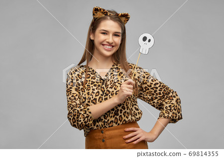 happy woman in halloween costume of leopard happy woman in halloween costume of leopard 69814355