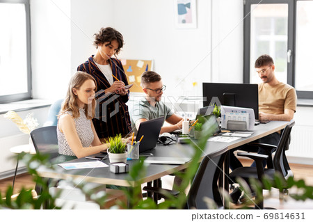business team or startuppers working at office business team or startuppers working at office 69814631