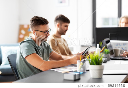 business team or startuppers working at office business team or startuppers working at office 69814638