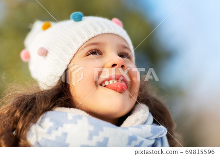 happy little girl having fun at winter park happy little girl having fun at winter park 69815596