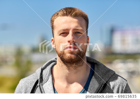 portrait of young man outdoors portrait of young man outdoors 69815635