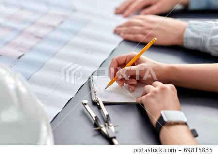 architect with notebook working at office architect with notebook working at office 69815835