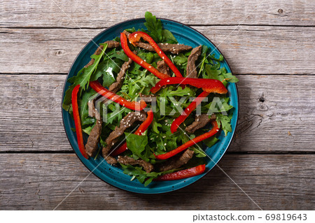 Healthy salad with beef red pepper 69819643