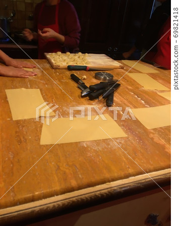 Making pasta Making pasta 69821418