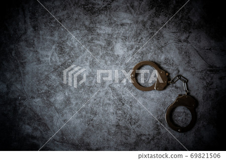 Handcuffs arrested 69821506