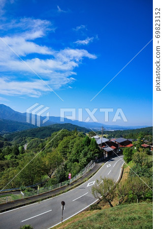 Old townscape, blue sky and roads of Magome-juku, Nakatsugawa City, Gifu Prefecture 69823152
