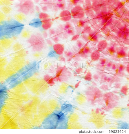 Tie dyed pattern on cotton fabric for background. Tie dyed pattern on cotton fabric for background. 69823624