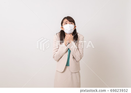 Business woman in a bright and refreshing smiling suit 69823932