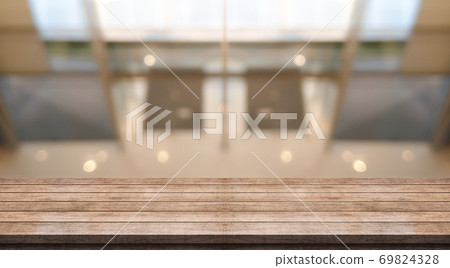 Empty wooden table top with lights bokeh on blur restaurant background Empty wooden table top with lights bokeh on blur restaurant background 69824328