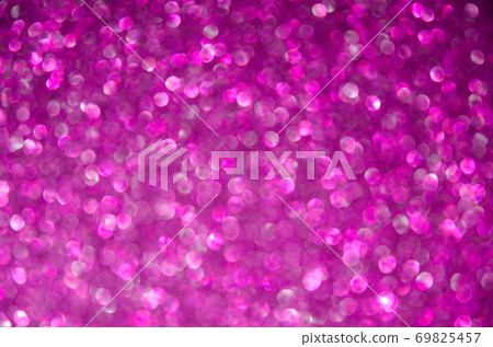 Dark purple defocused glitter lights background. Rounded defocused lights. Abstract bokeh background with copy space and text place Dark purple defocused glitter lights background. Rounded defocused lights. Abstract bokeh background with copy space and text place 69825457